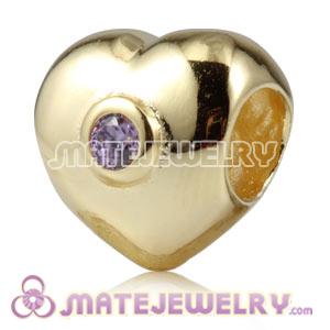 Gold plated silver heart bead with stones